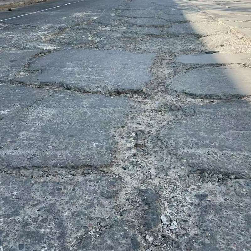 平坝路面起砂露石子修补料